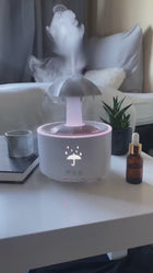 RainDrop diffuser in action — droplets, mist and warm glow