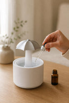 Adding essential oil to the water tank